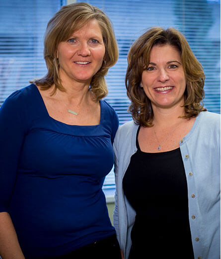 Dr. Seidman  next to her patient